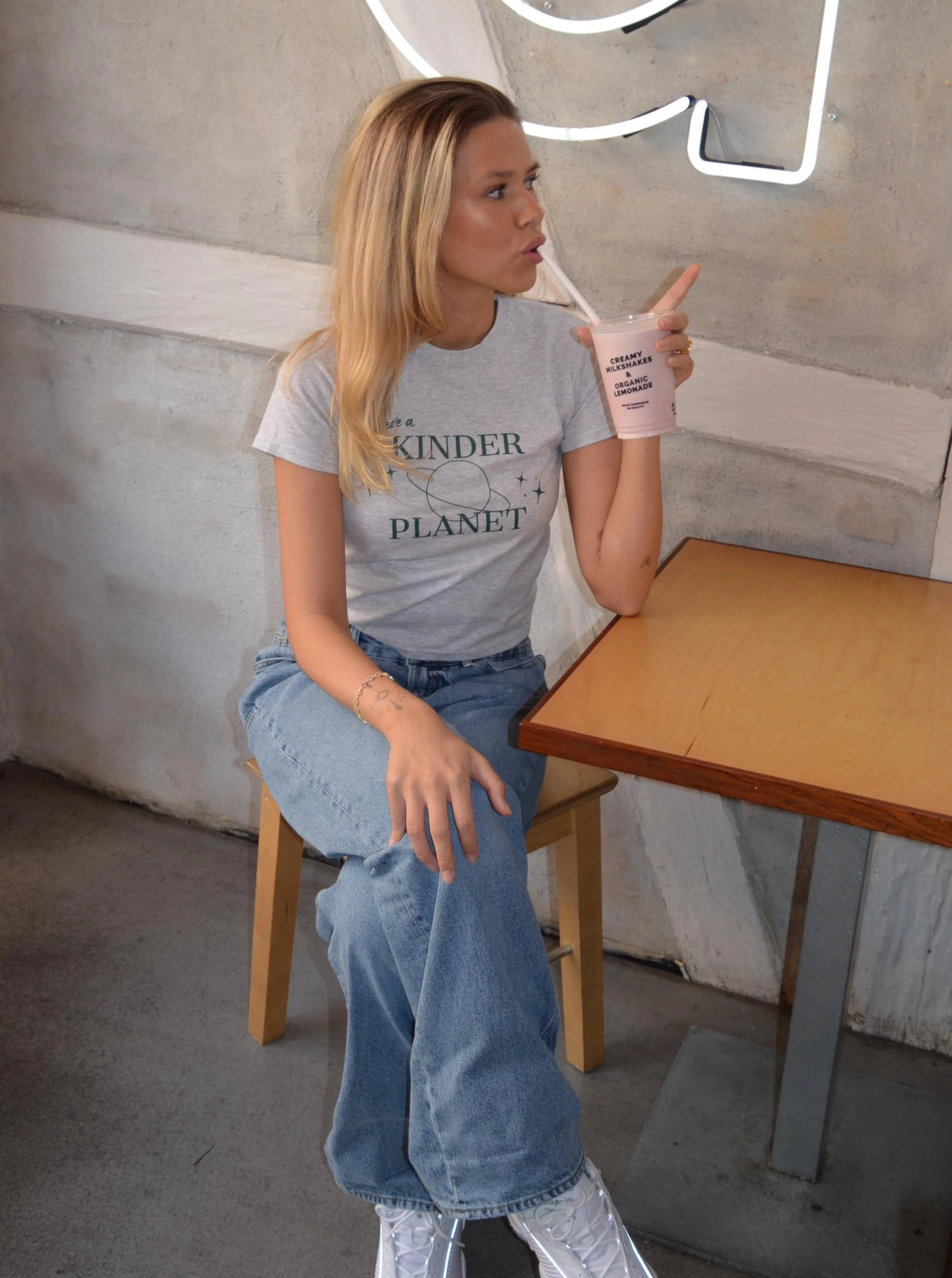 "Create a kinder planet" baby tee - grey