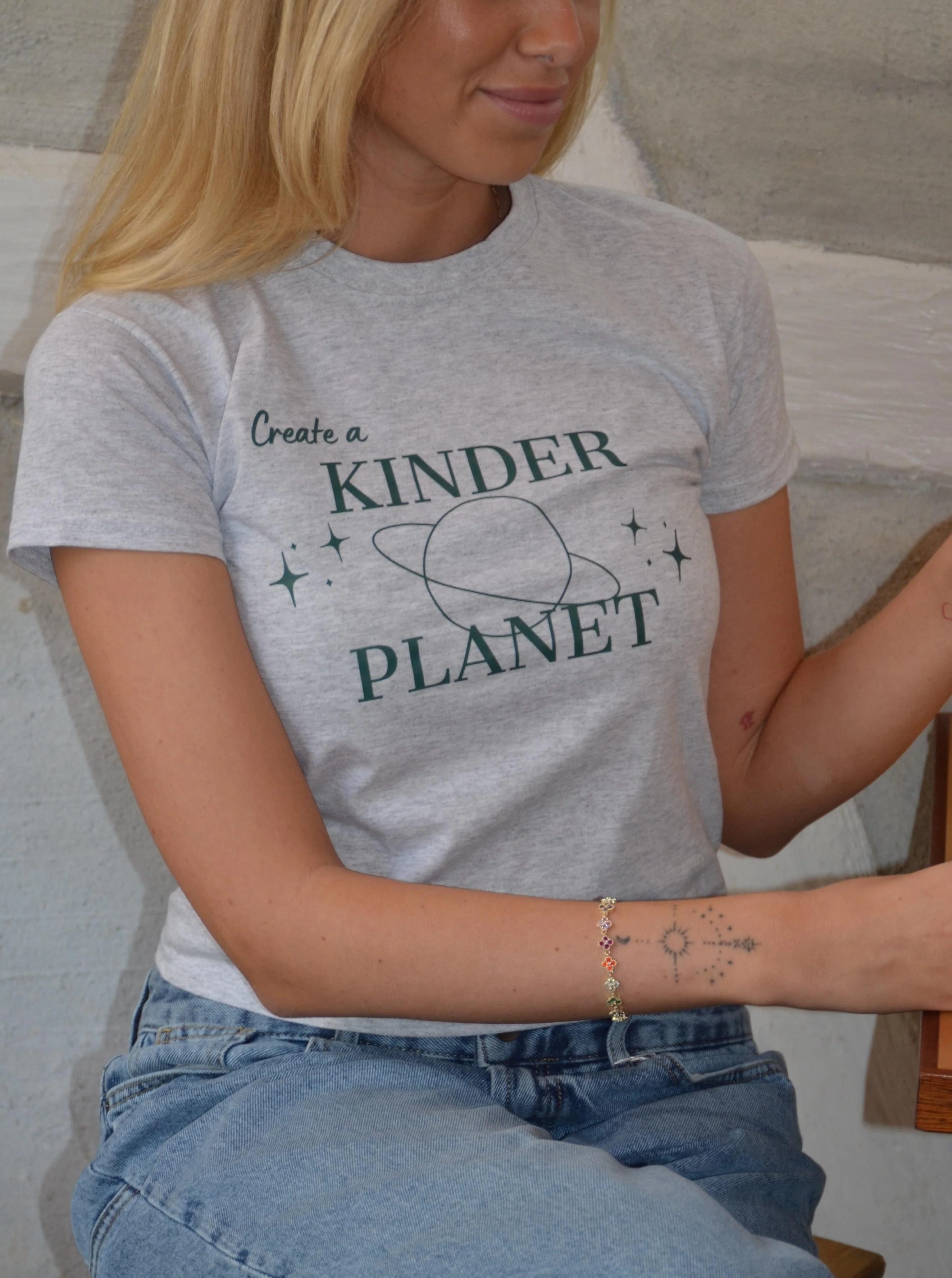 "Create a kinder planet" baby tee - grey